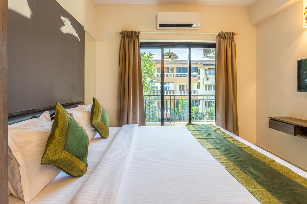 Treebo Trend Zeebo Suites Arpora Exterior foto
